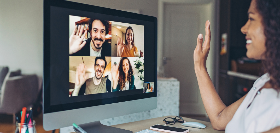 Take a moment out of your busy week to reflect and recharge with changemakers from across the globe. Brown skinned woman with curly brown hair waves at a computer screen with multiple people smiling and waving back at her